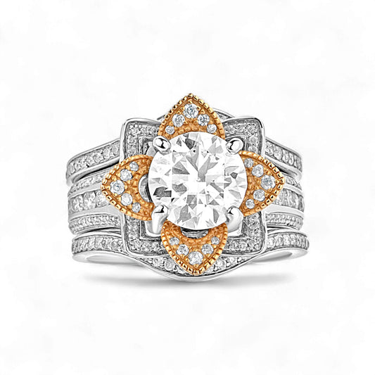 Diamond ring with gold and silver design on a white background