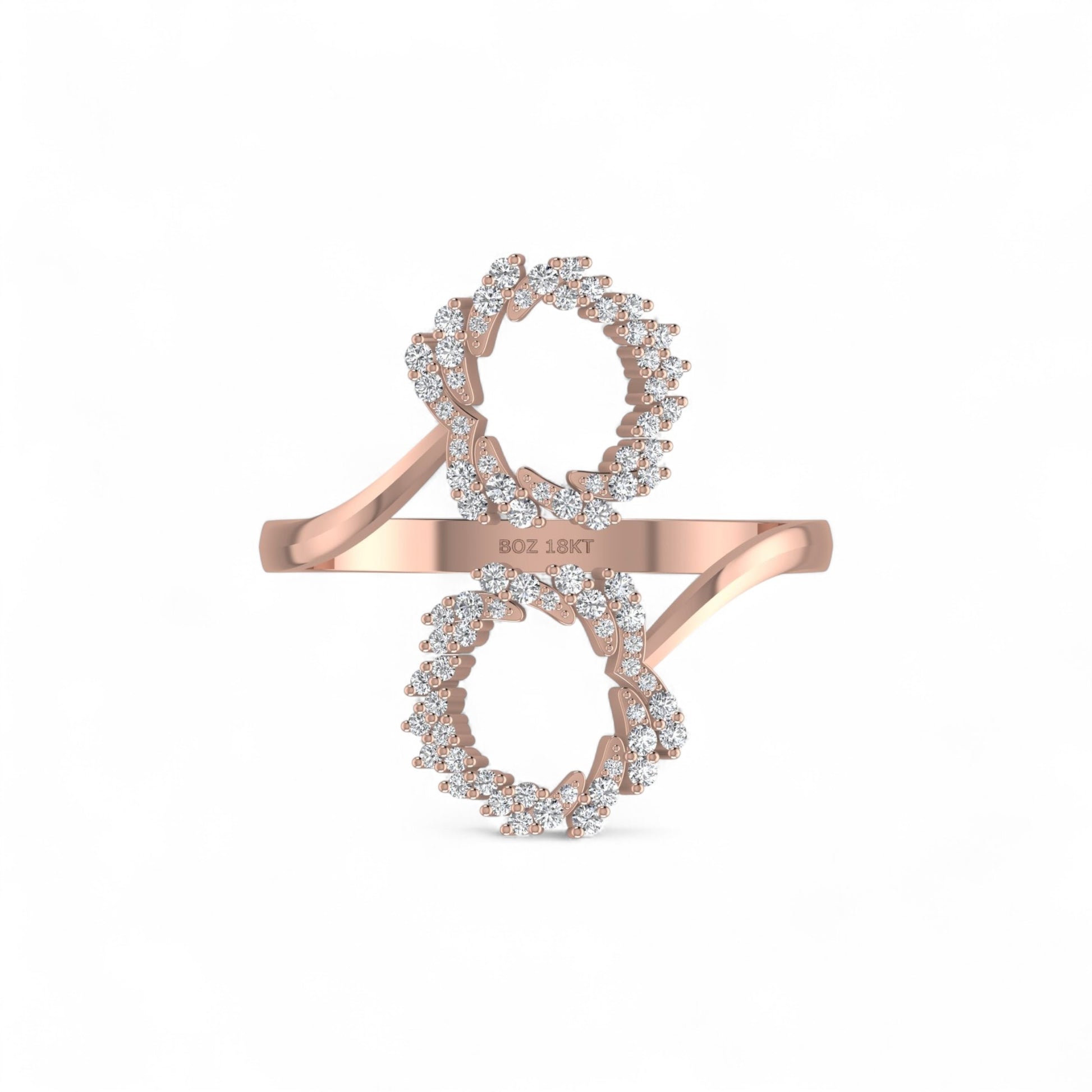 Rose gold ring with diamond accents on a white background