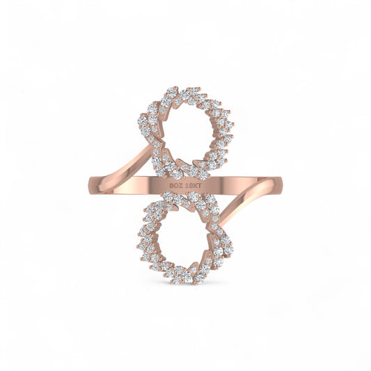 Rose gold ring with diamond accents on a white background