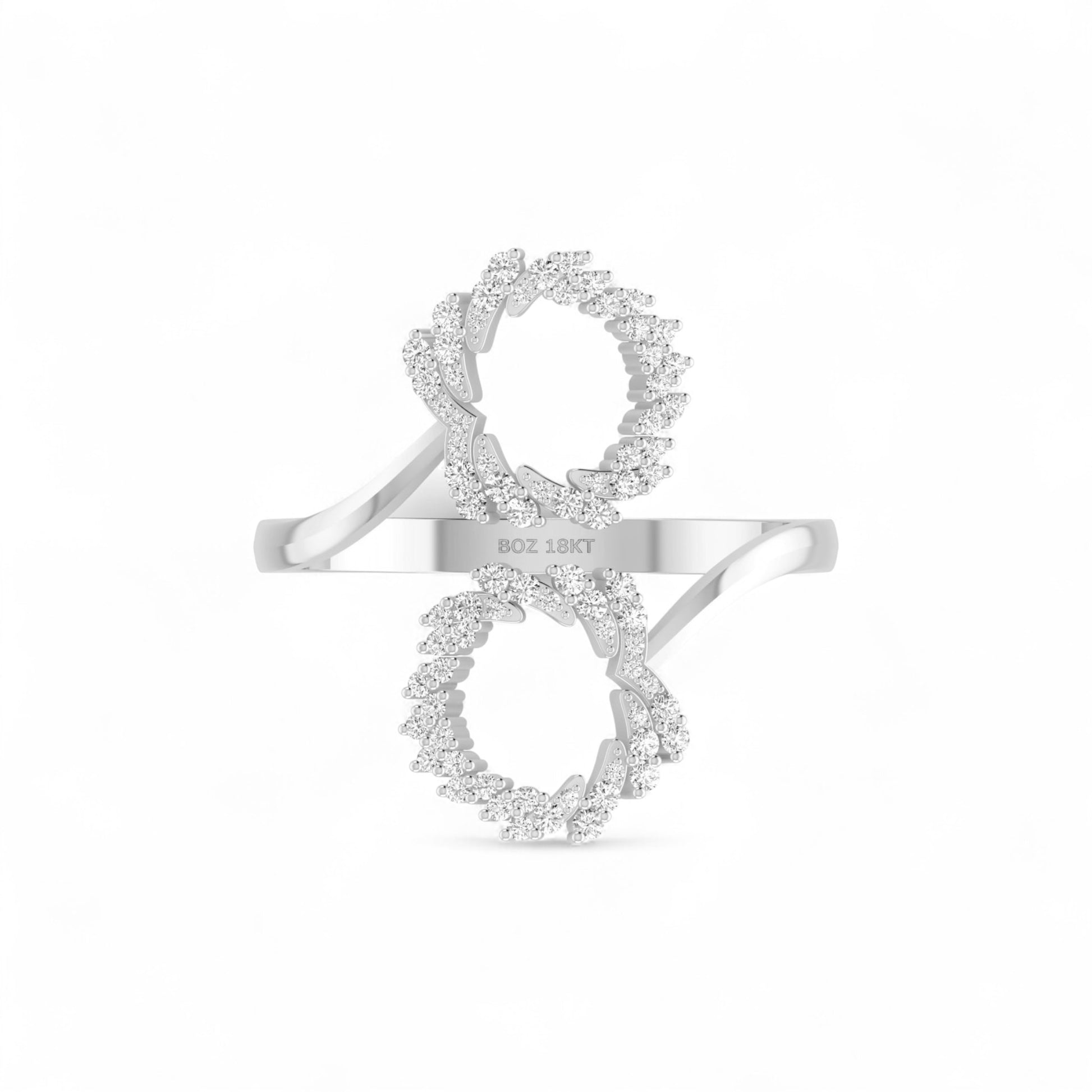 Silver ring with diamond accents on a white background