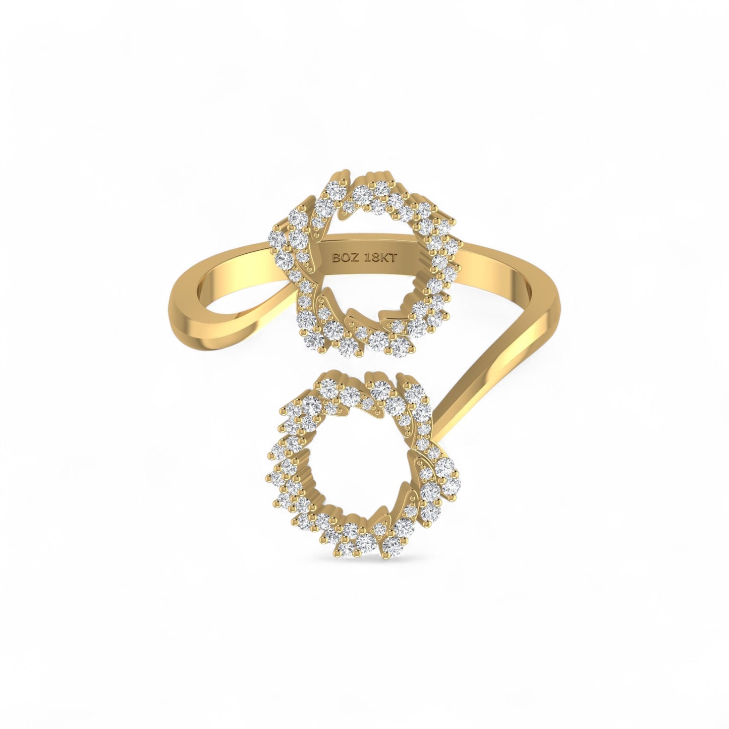Gold ring with diamond accents on a white background