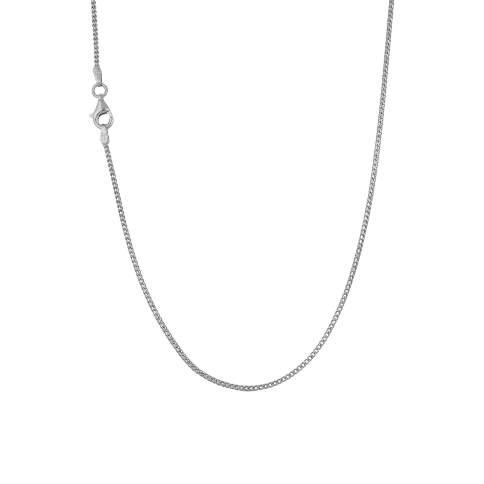 Silver chain necklace on a white background