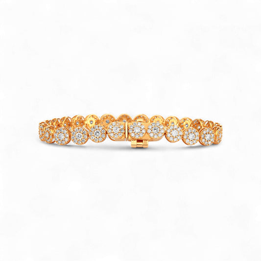 Gold bracelet with diamond accents on a white background