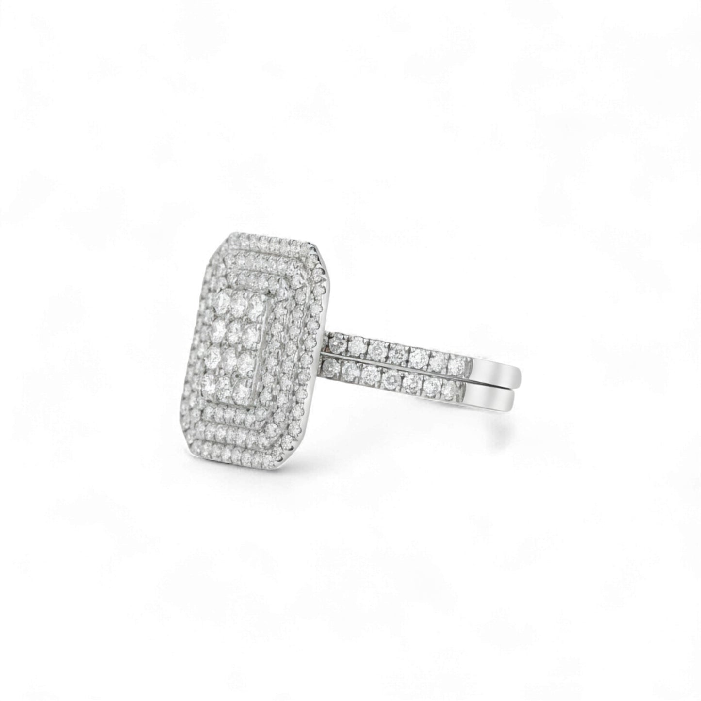 Silver ring with diamond accents on a white background