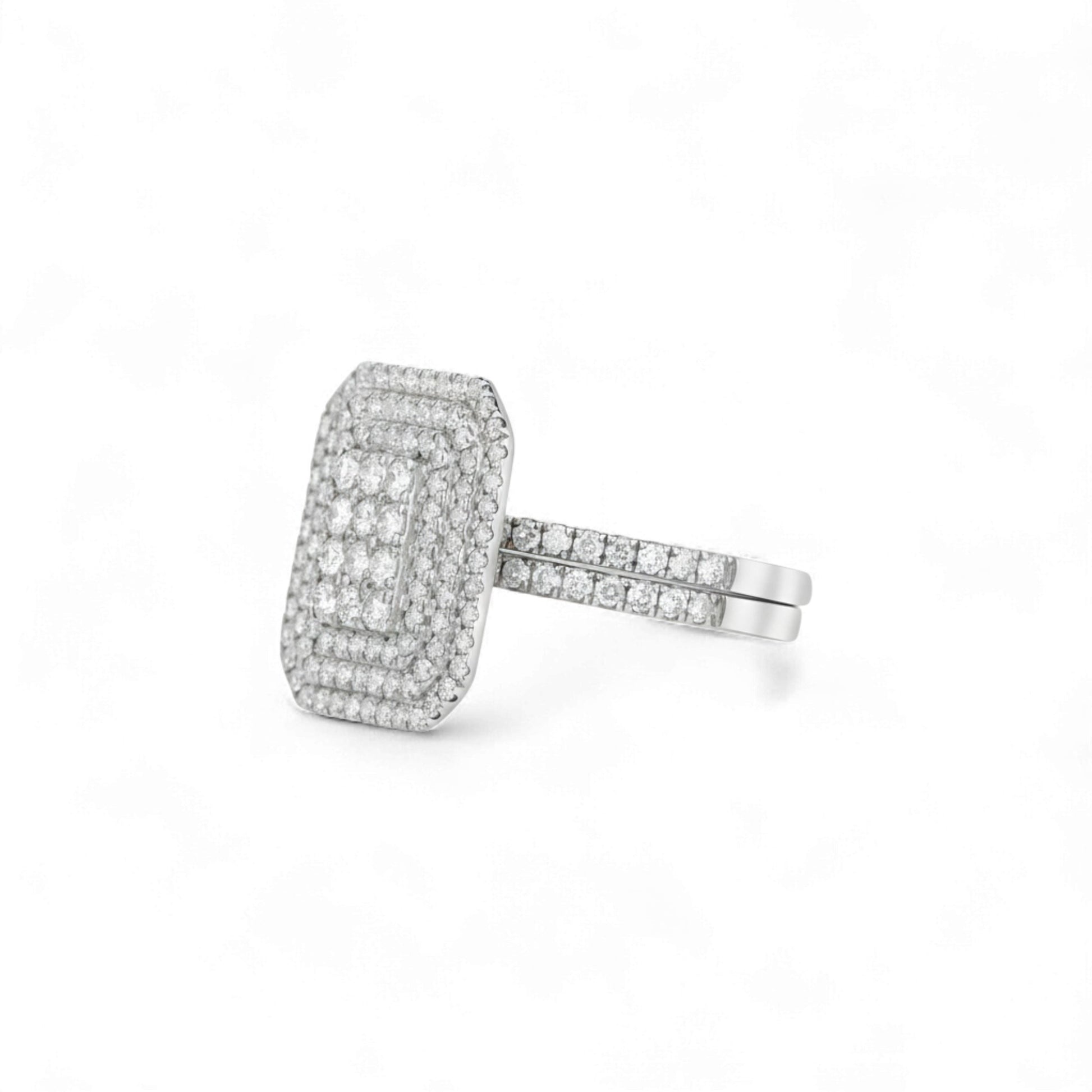 Silver ring with diamond accents on a white background