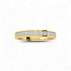 Gold ring with diamonds on a white background