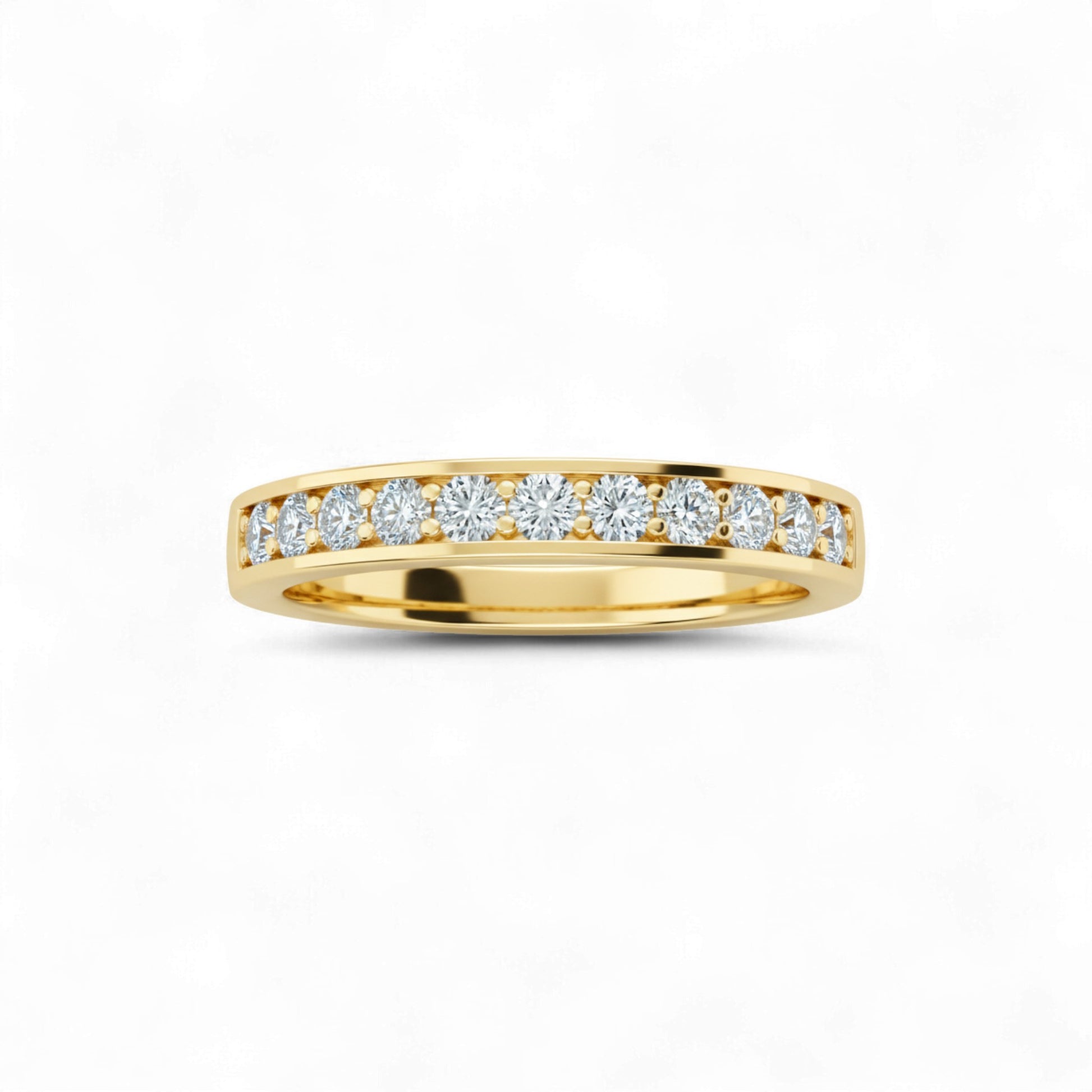 Gold ring with diamonds on a white background