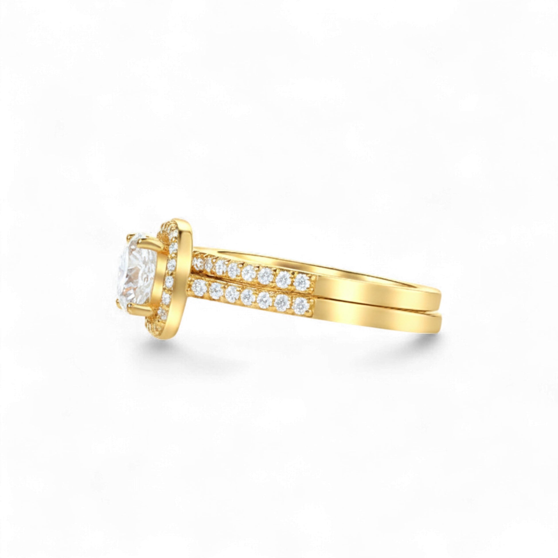 Gold ring with a diamond on a white background
