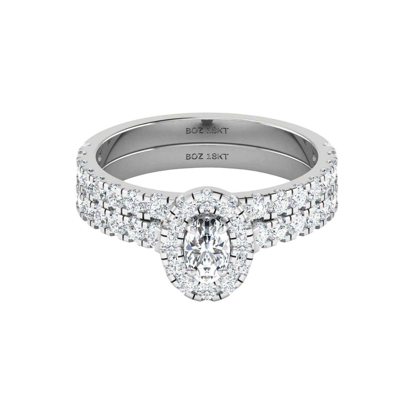 Diamond ring with 'BOZ' engraving on a white background