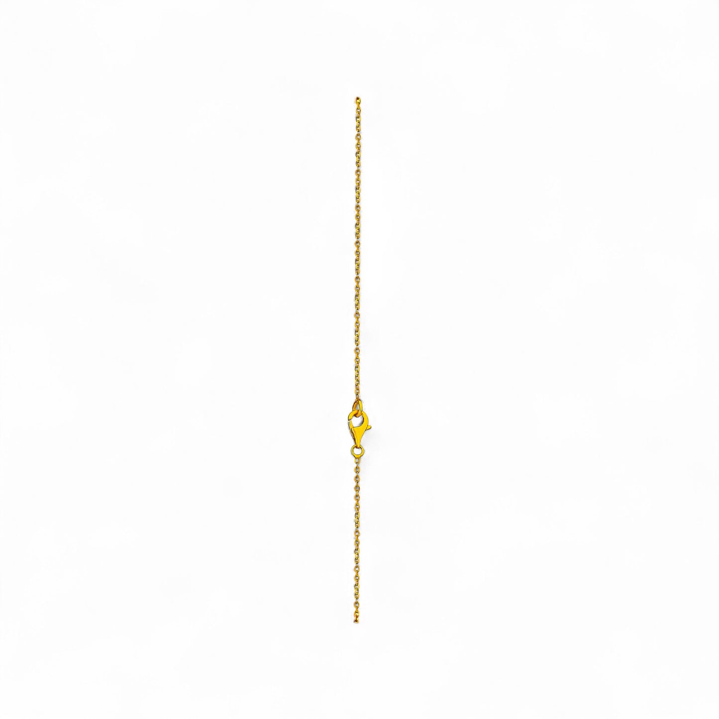 Gold chain necklace on a white background