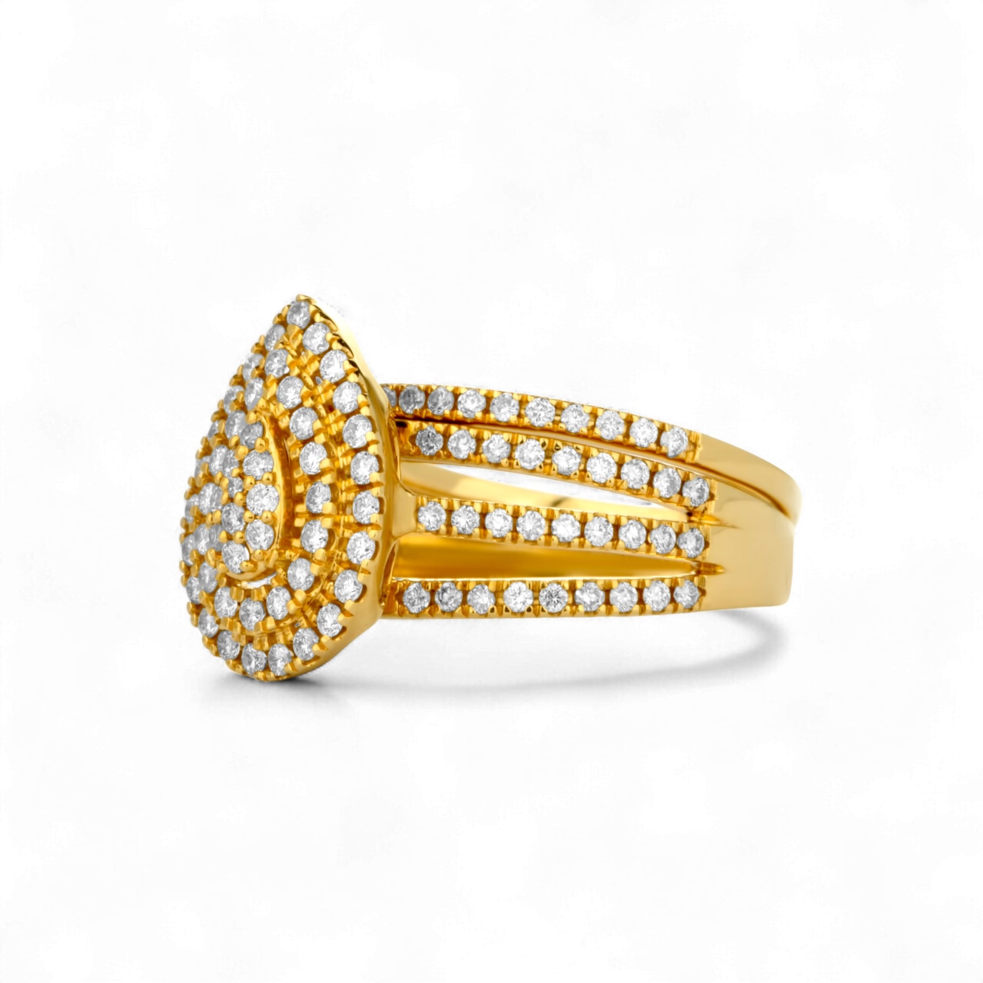 Gold ring with diamond accents on a white background