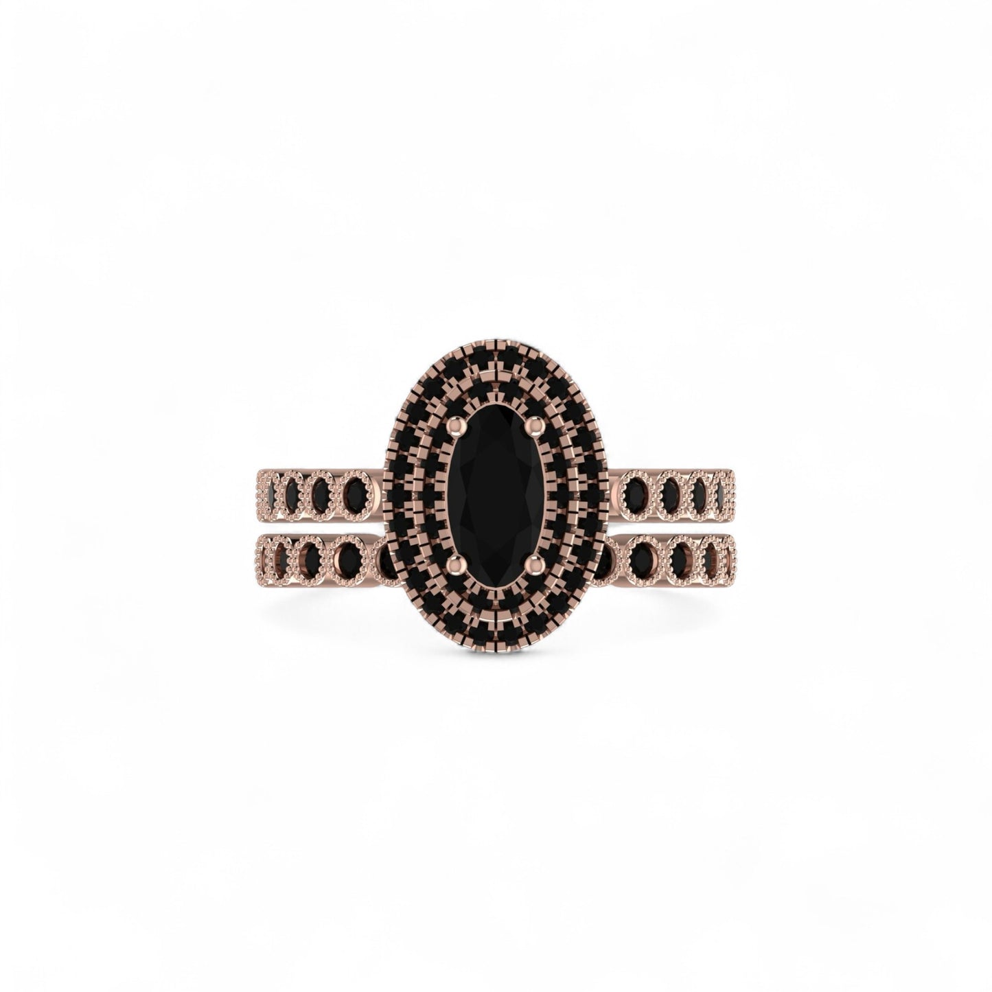 Rose gold ring with black gemstone on a white background