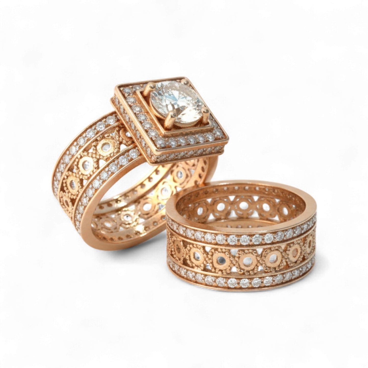 Two rose gold rings with diamond accents on a white background