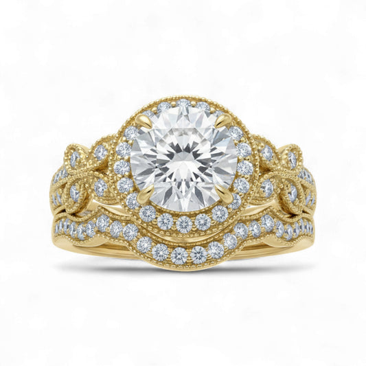 Gold ring with a large diamond and smaller diamonds on a white background