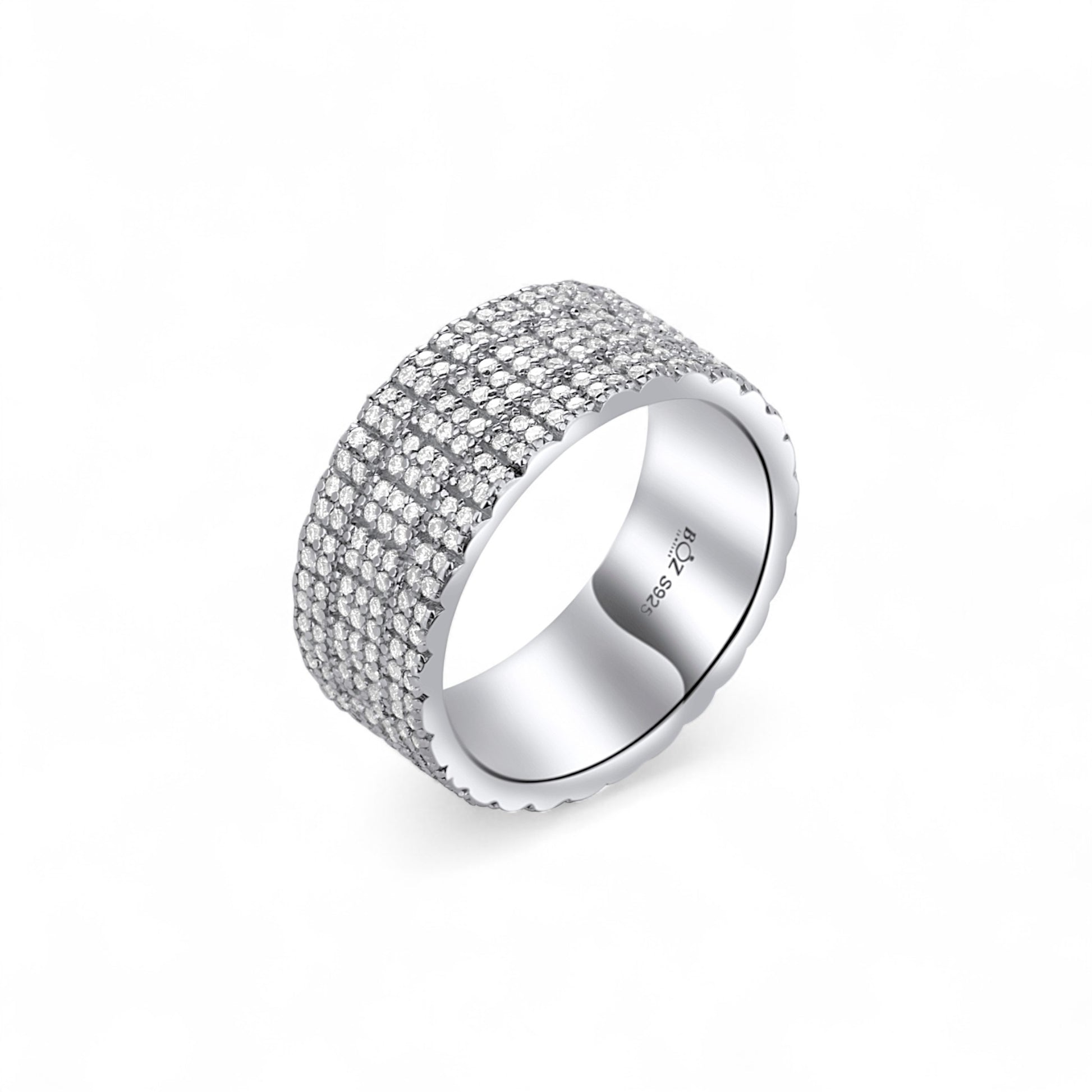 Silver ring with multiple rows of diamonds on a white background