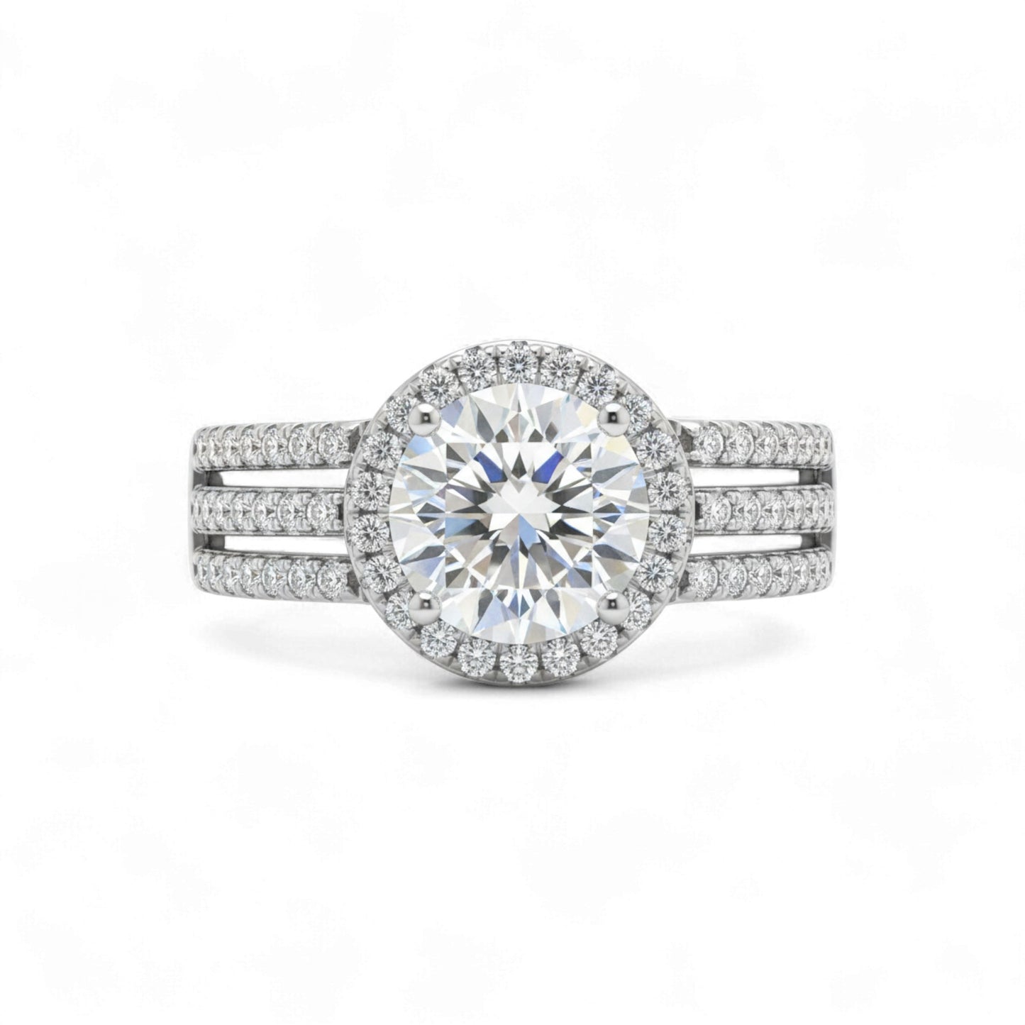 Diamond ring with a halo and side stones on a white background