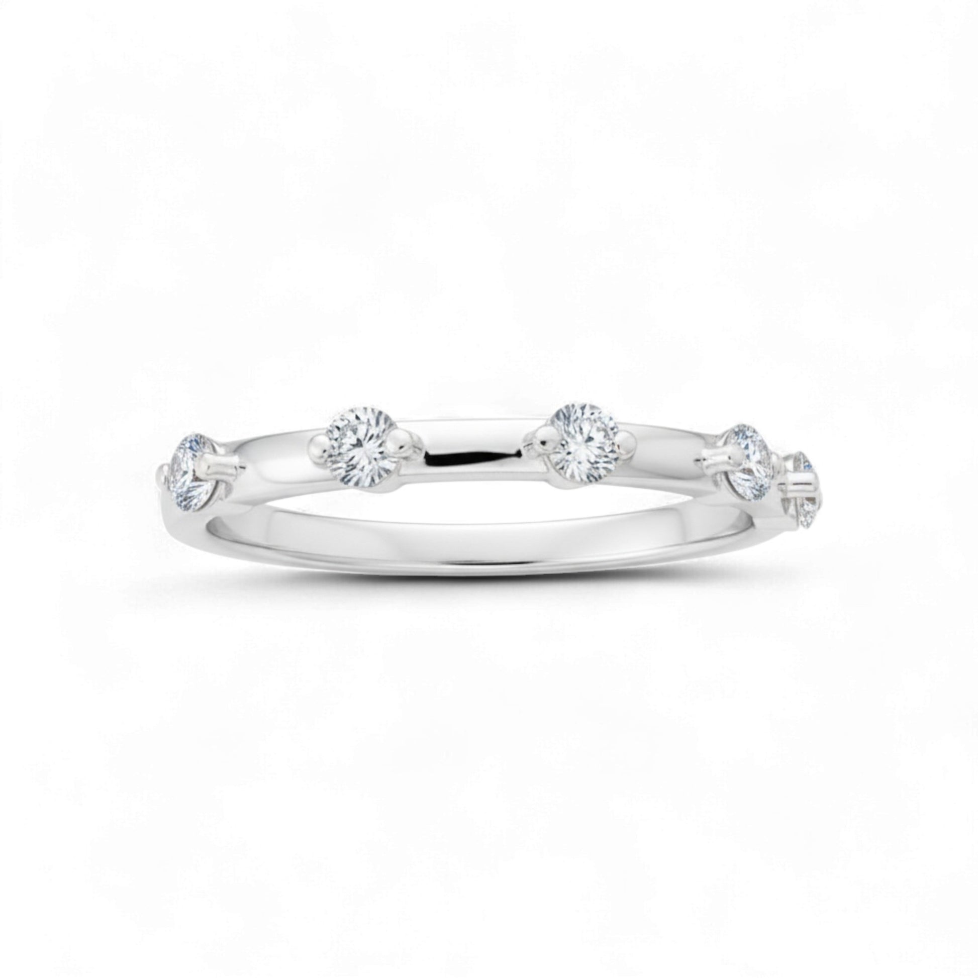 Silver ring with small diamonds on a white background