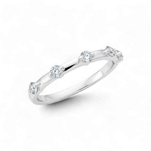 Silver ring with small diamonds on a white background