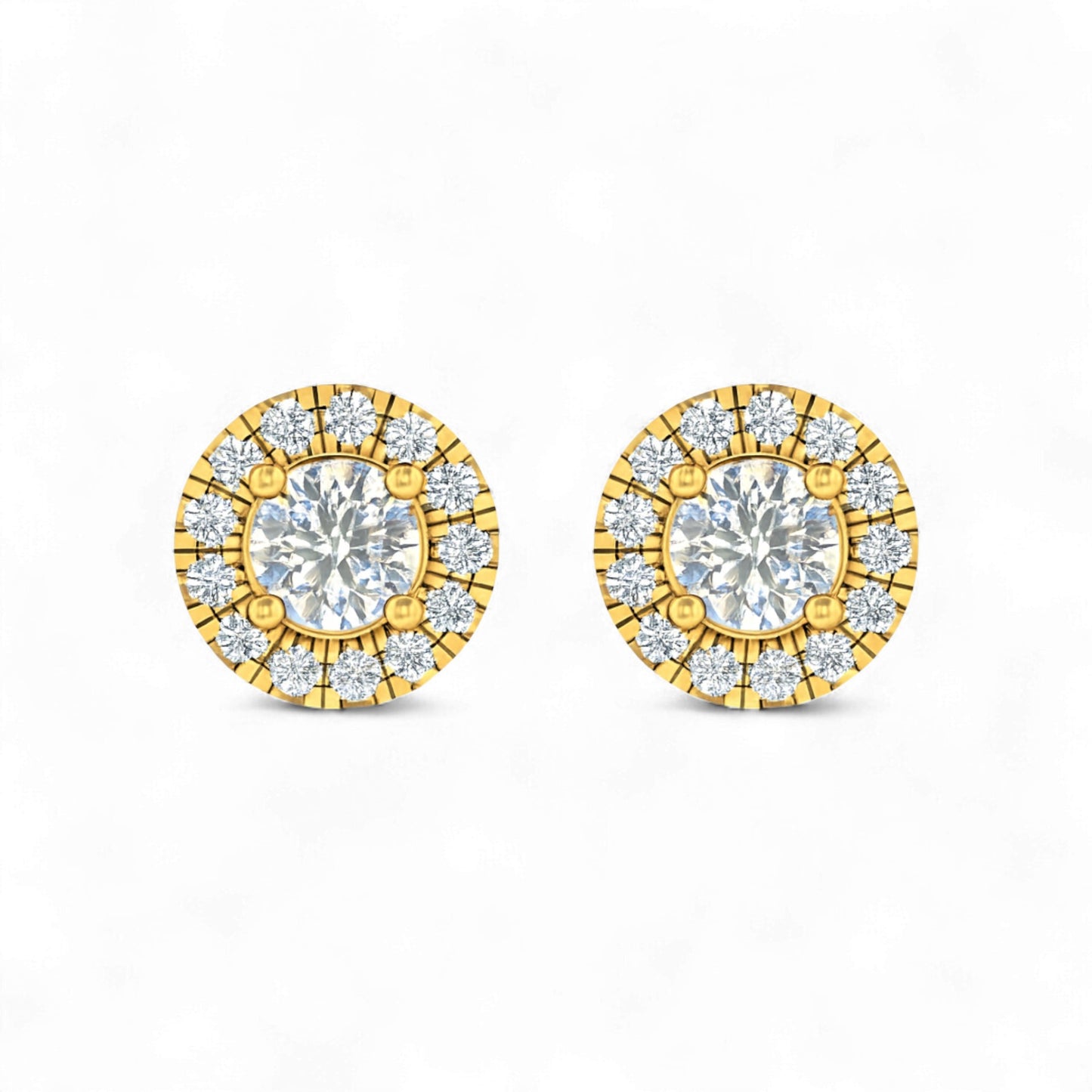 Gold and diamond earrings on a white background