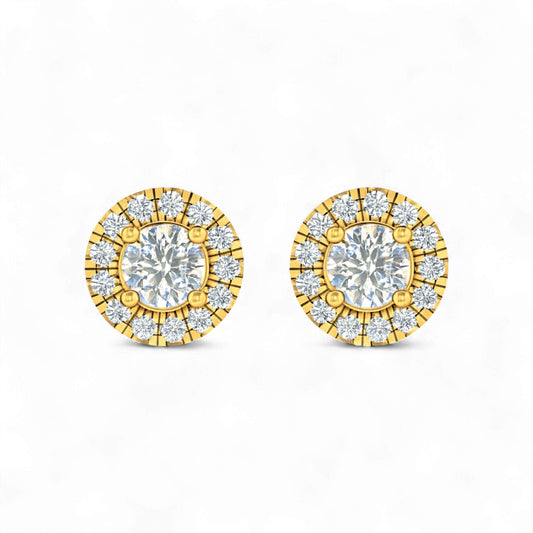 Gold and diamond earrings on a white background
