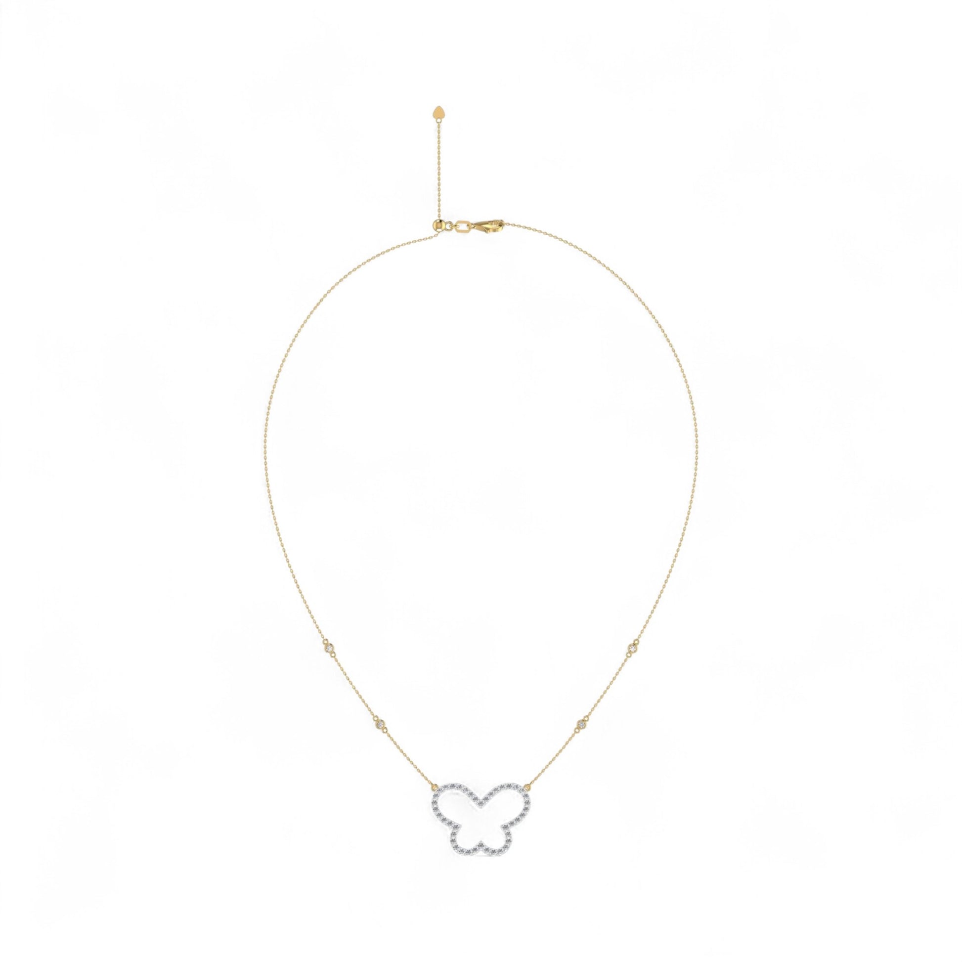Butterfly-shaped pendant on a gold chain against a white background