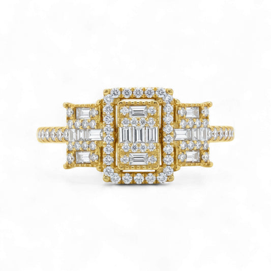 Gold ring with diamond accents on a white background