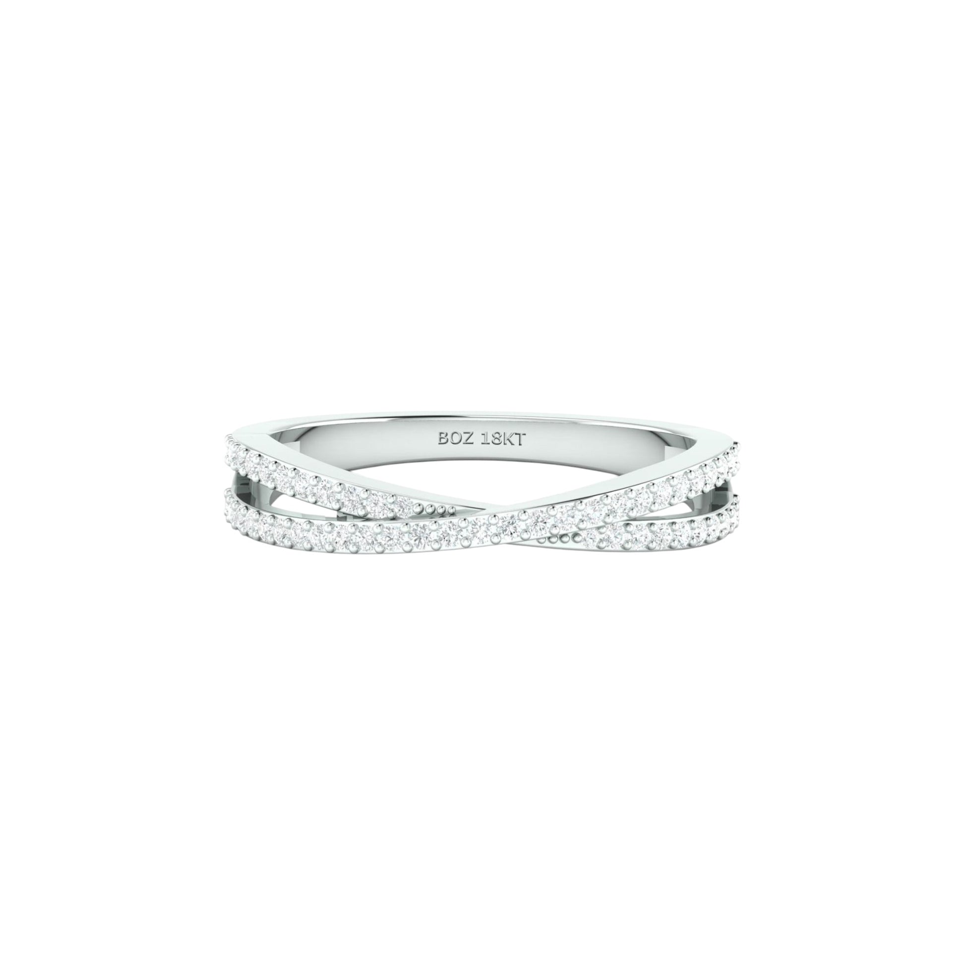 Silver ring with small diamonds on a white background