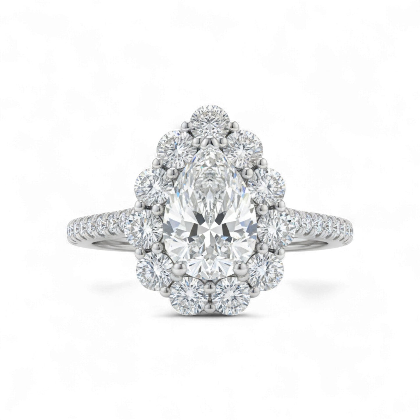 Diamond ring with a pear-shaped center stone on a white background