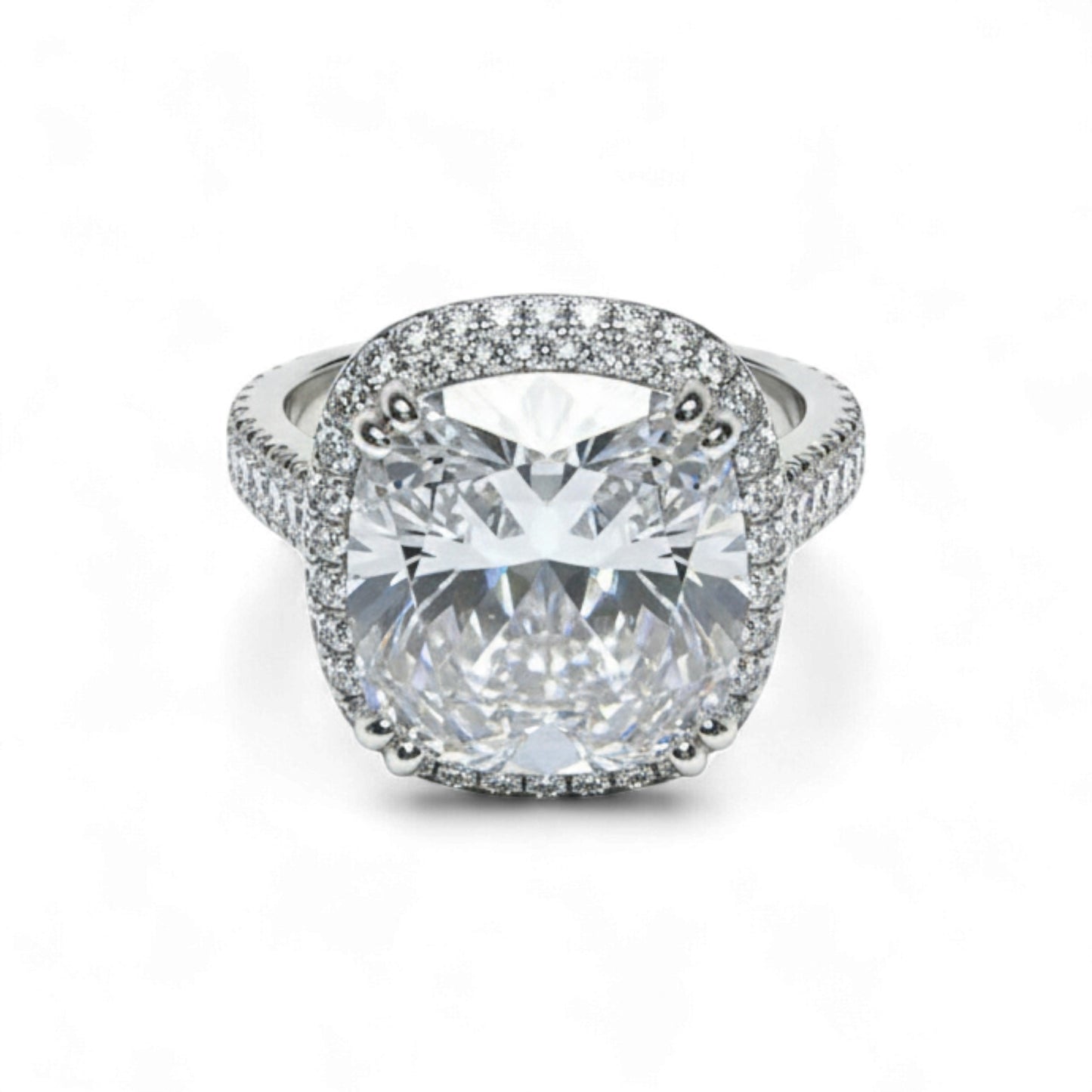 Diamond ring with a large central gemstone and smaller stones around on a white background