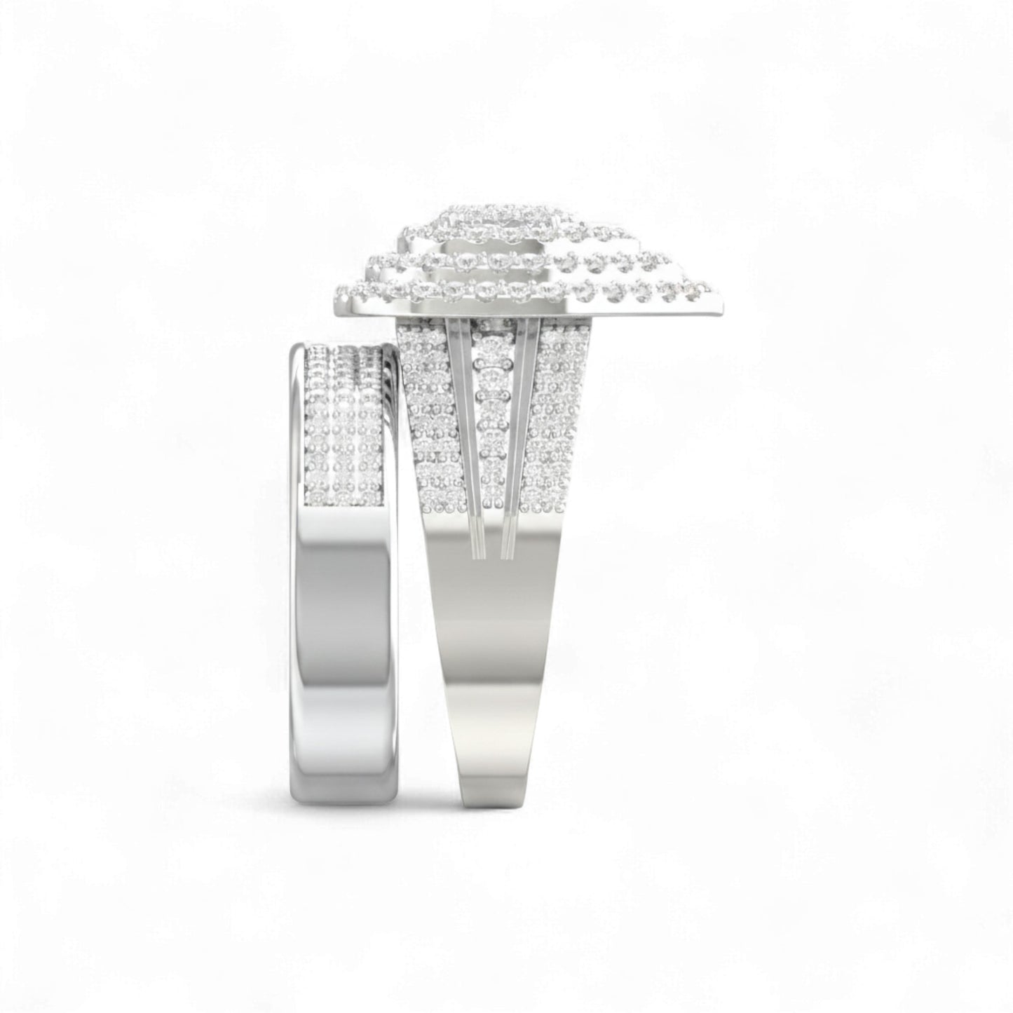 Pair of silver rings with diamond accents on a white background