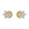 Gold earrings with diamond-like stones on a white background