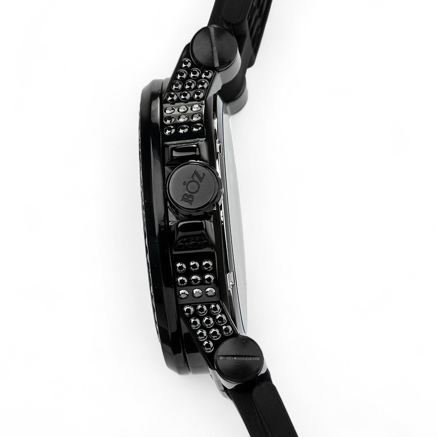 Close-up of a black wristwatch with detailed design on a white background