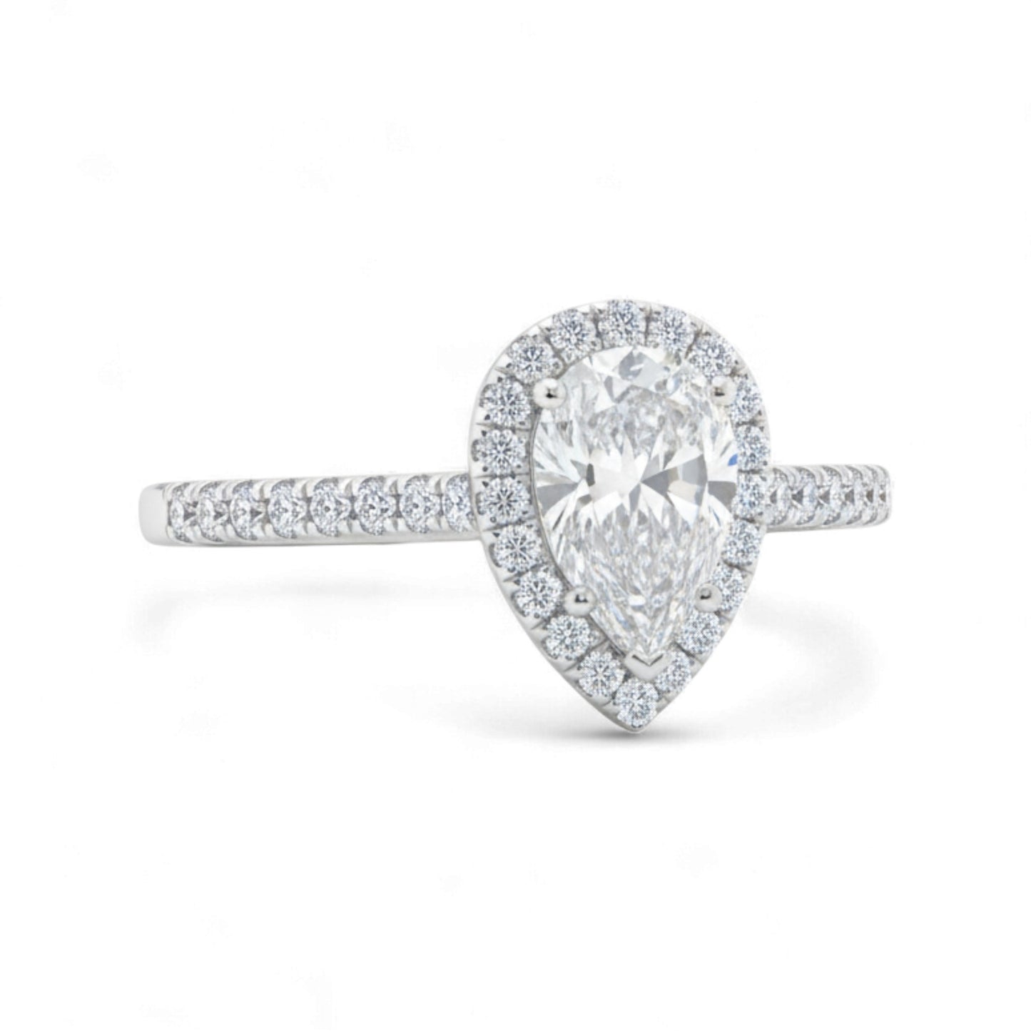 Diamond ring with pear-shaped center stone on a white background