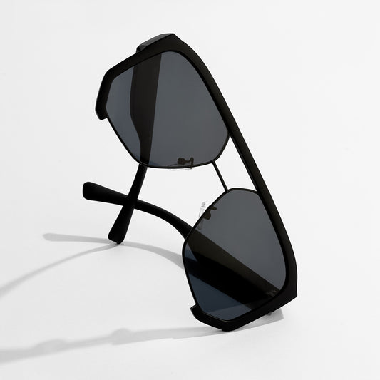 Black sunglasses with reflective lenses on a white background