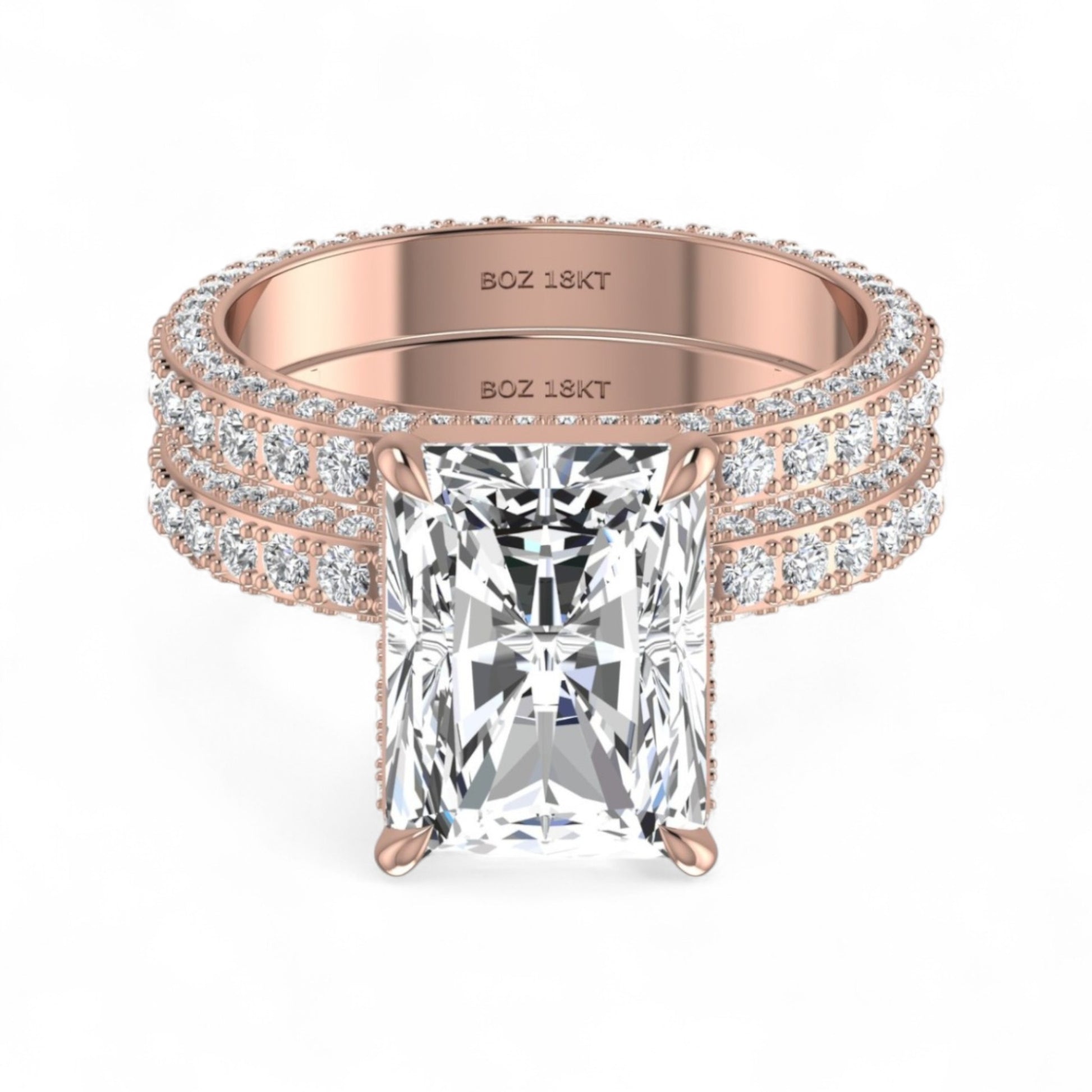 Rose gold ring with a large diamond and smaller diamonds on the band against a white background