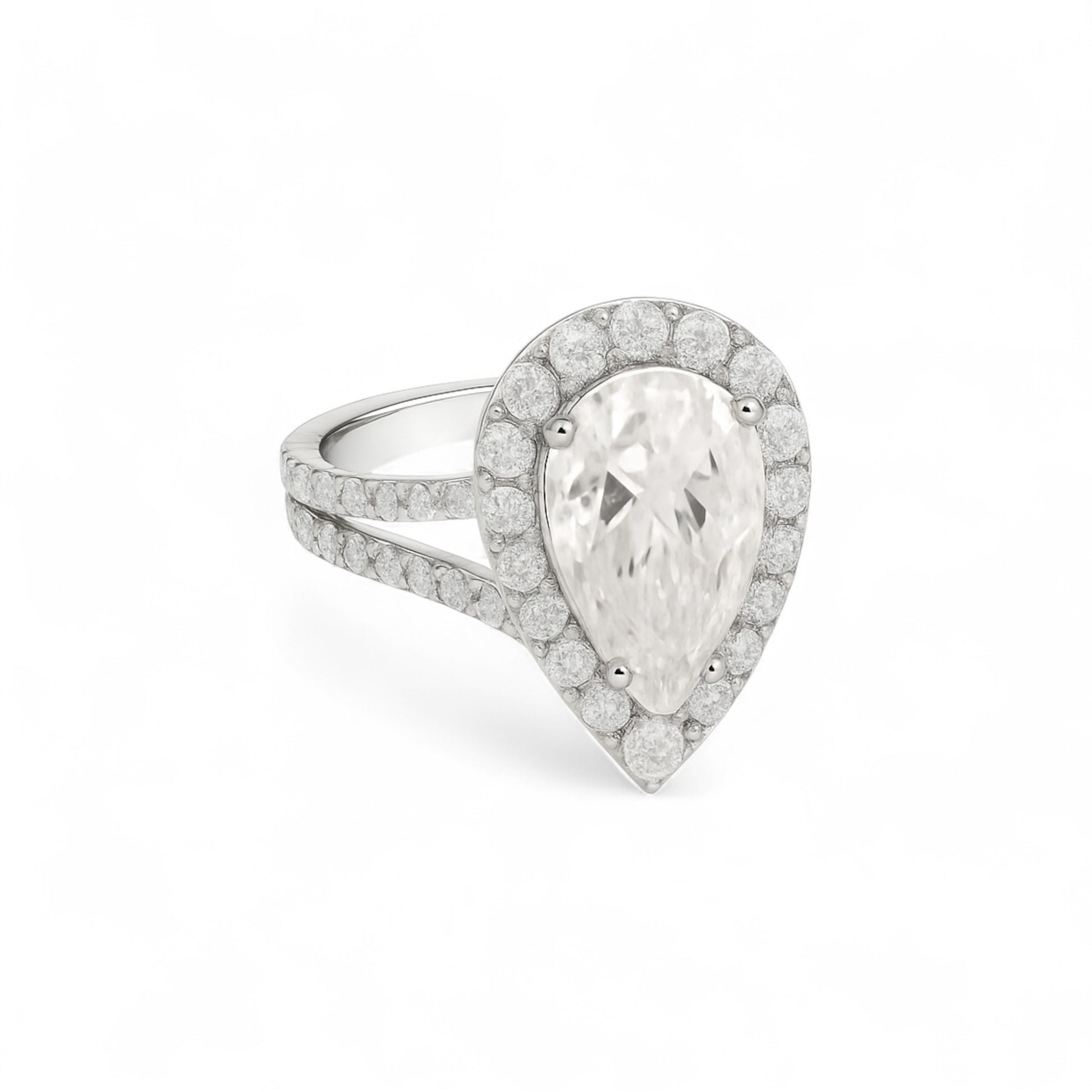 Diamond ring with a pear-shaped center stone on a white background