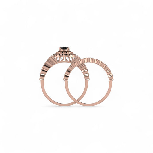 Rose gold ring with a central gemstone on a white background