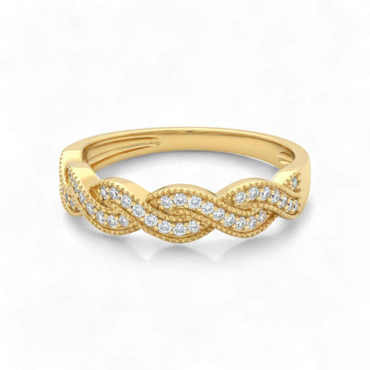 Gold ring with diamond accents on a white background