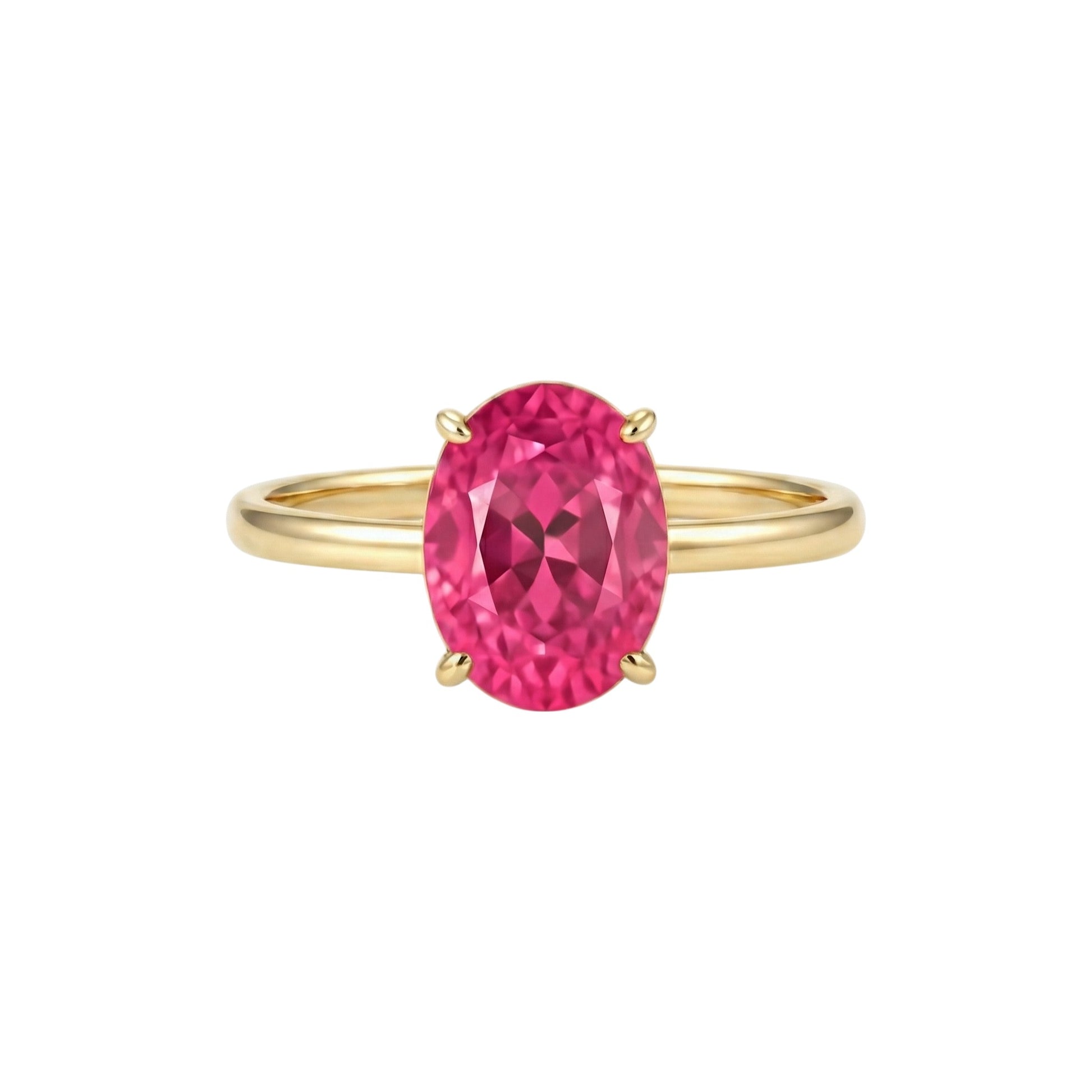 Gold ring with a pink gemstone on a white background