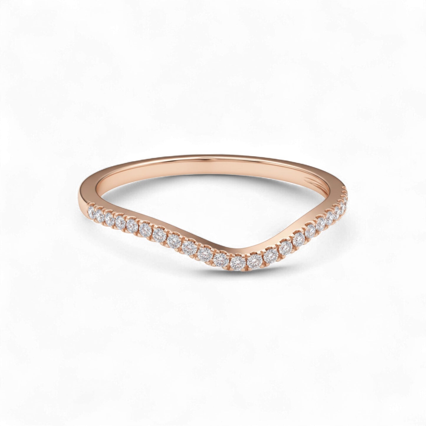 Rose gold ring with small diamonds on a white background