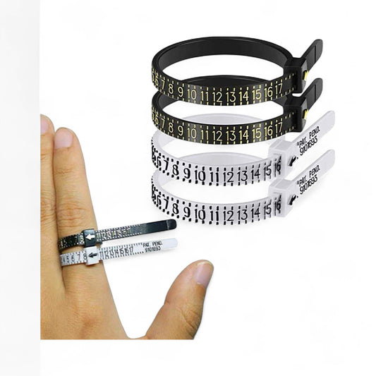 Set of three measuring tapes in black, white, and green held by a hand on a white background.