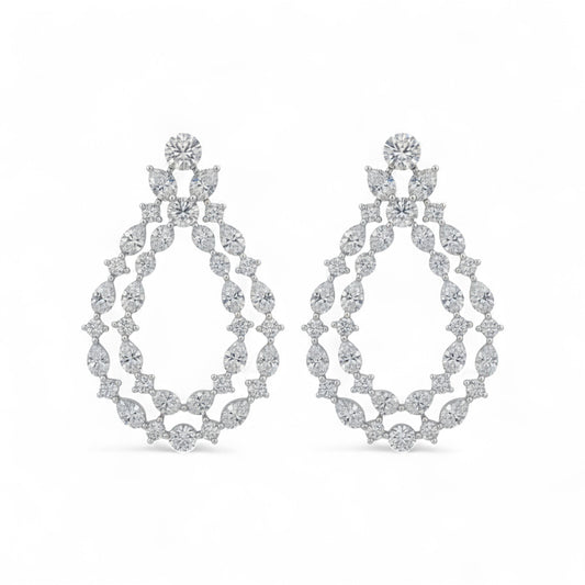 Pair of diamond earrings on a white background