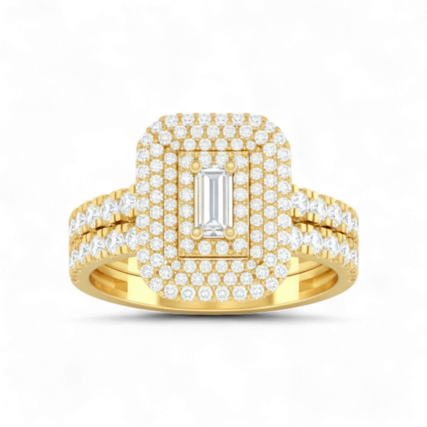 Gold ring with emerald-cut center stone and diamond accents on a white background