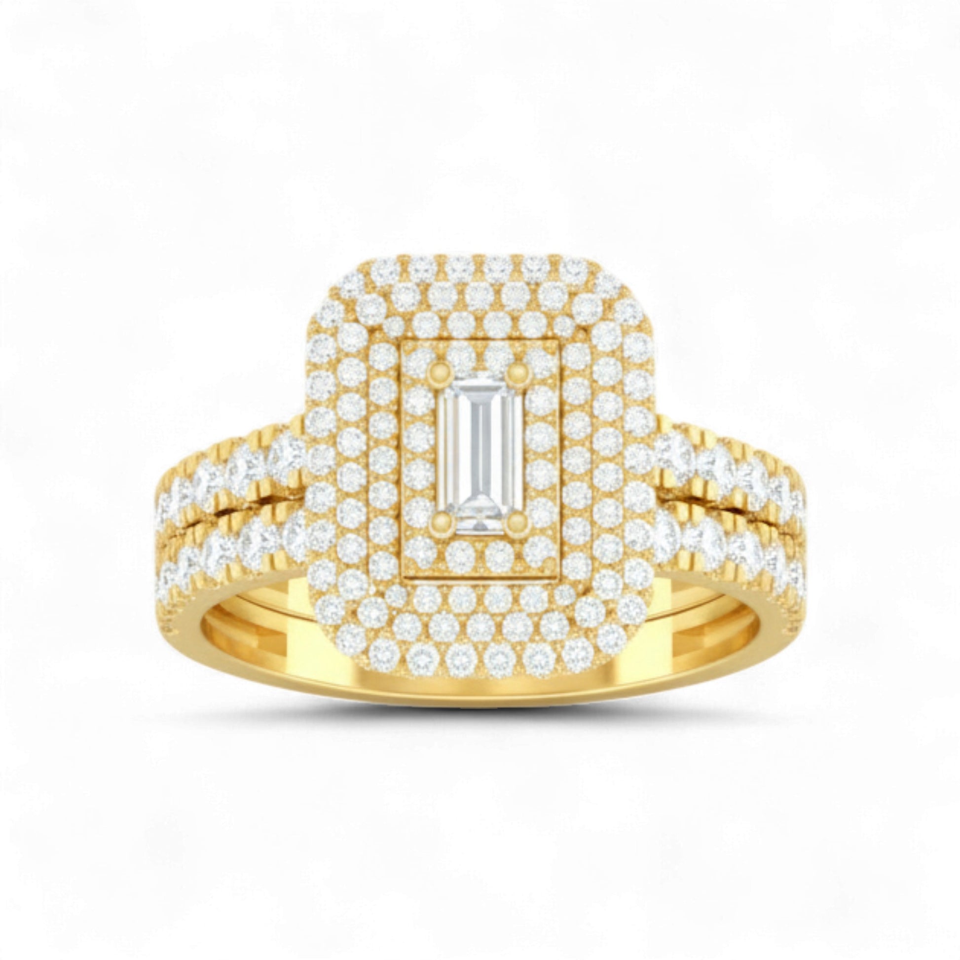 Gold ring with emerald-cut center stone and diamond accents on a white background