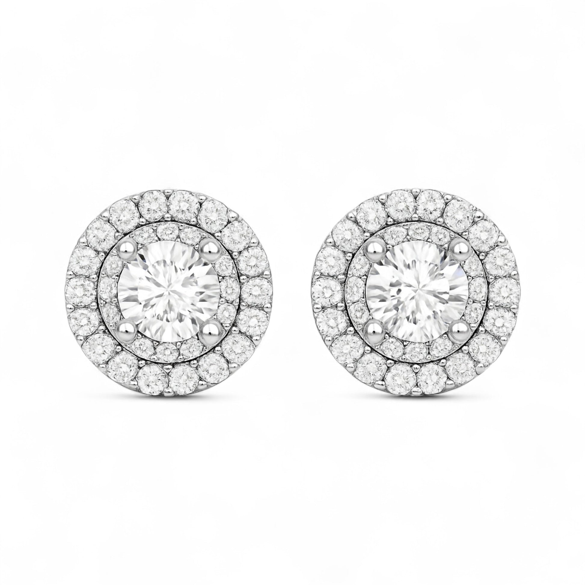 Pair of diamond earrings on a white background