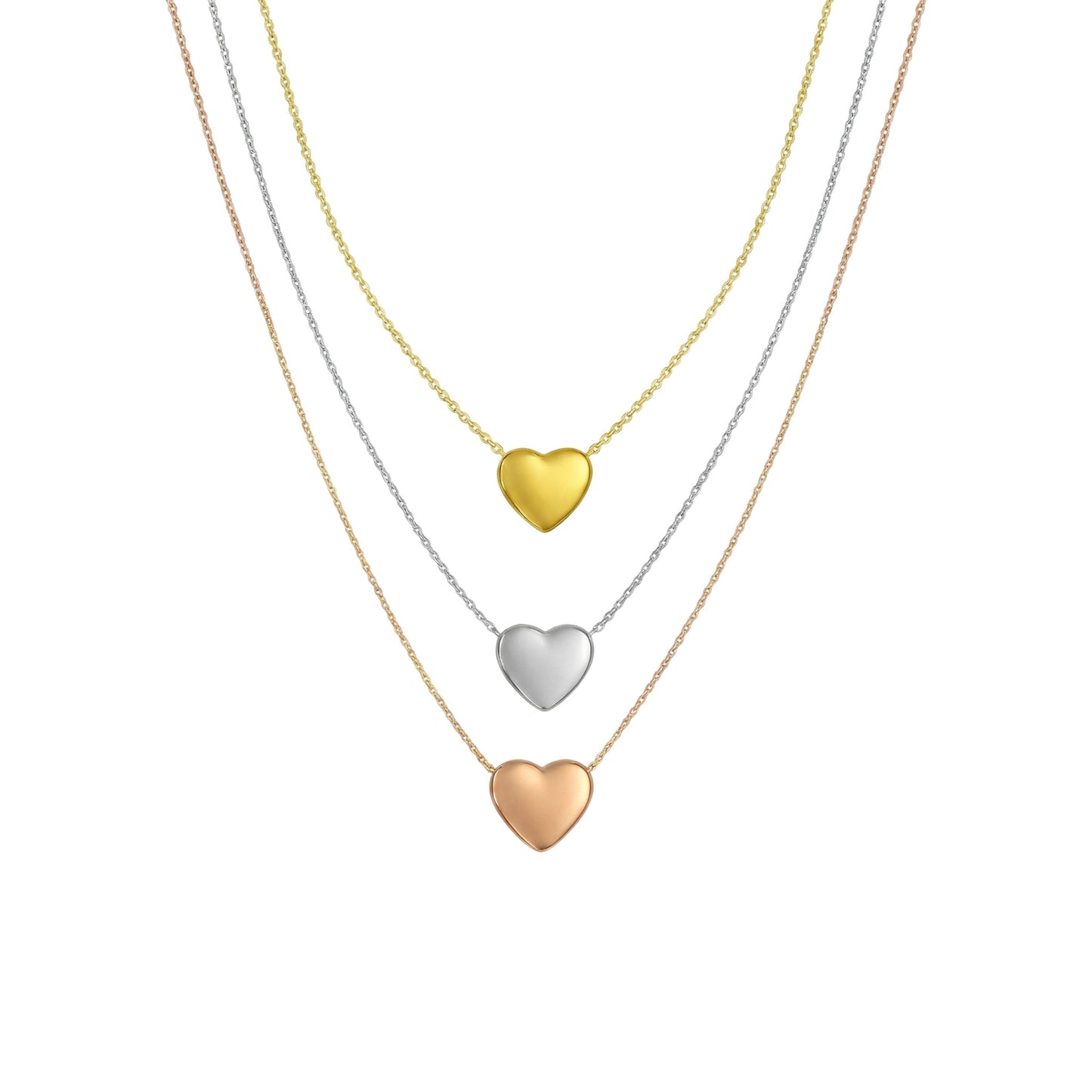 Three heart-shaped pendants on gold necklaces against a white background