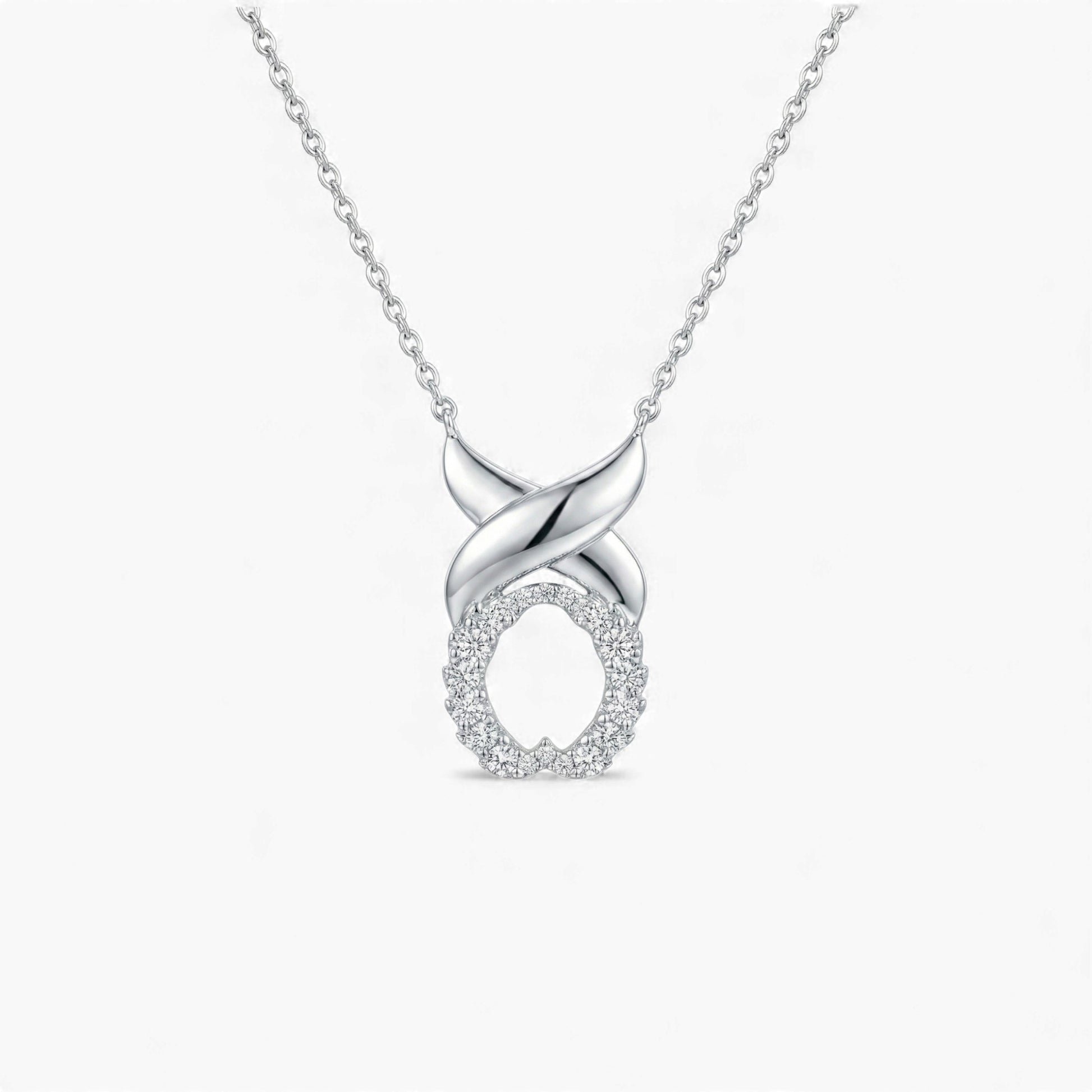 Silver necklace with an infinity pendant on a white background