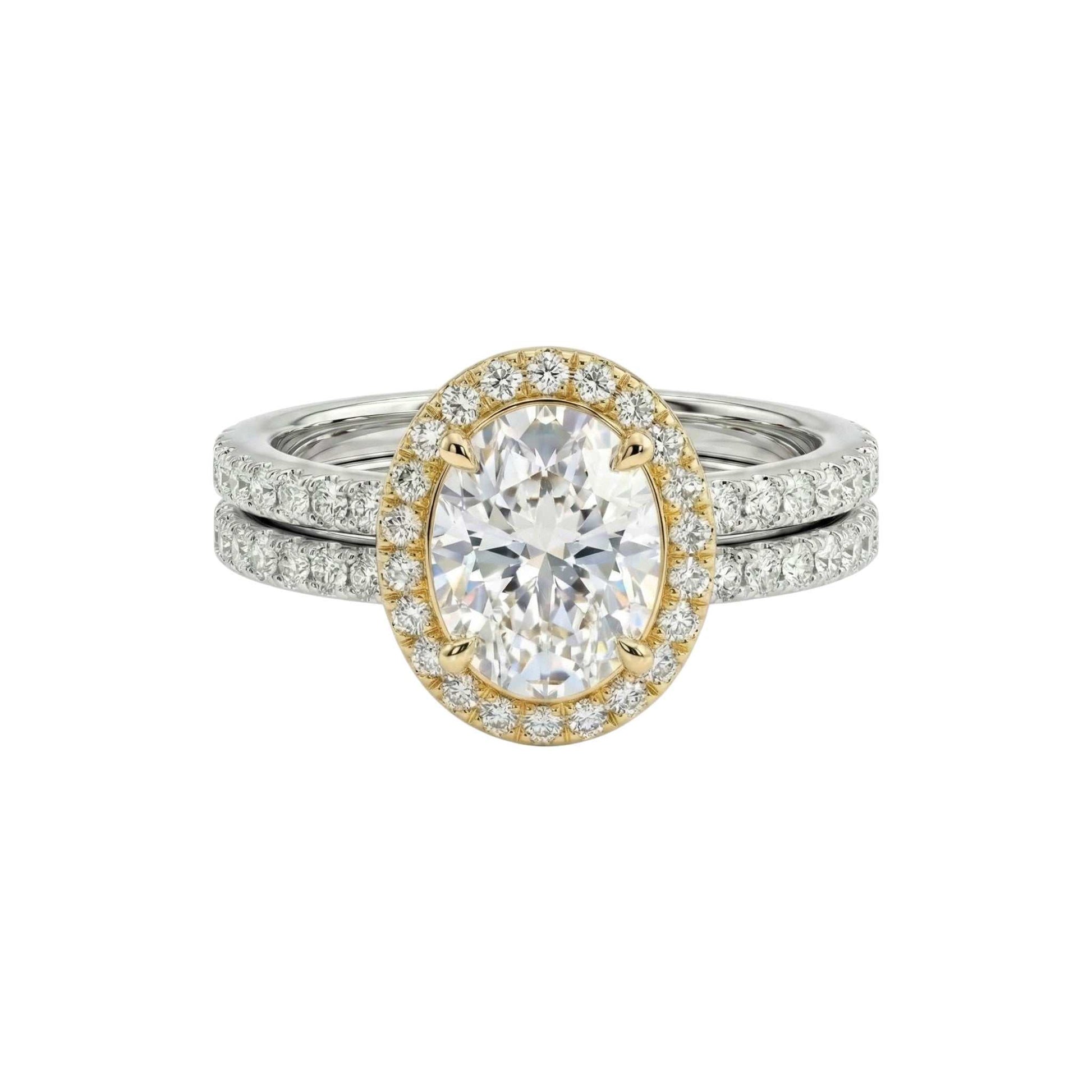 Two diamond rings, one gold and one silver, on a white background